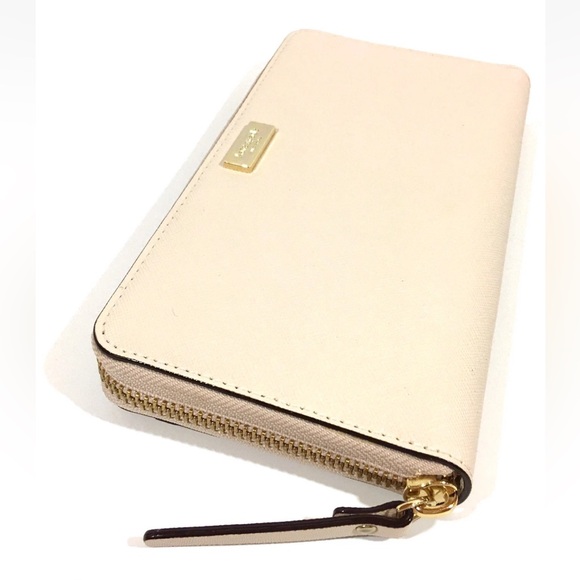 Kate Spade Handbags - Kate Spade Baby Pink Zip-Around Wallet – Elegant & Functional!
